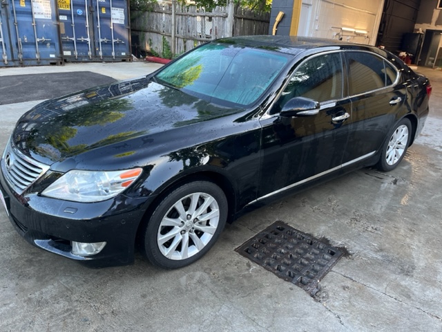 Freshly washed black Lexus sedan after a full auto detail at 2Shady Tinting